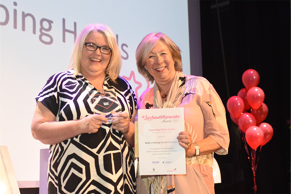 Winner Bede's Helping Hands Food Bank presented with their award