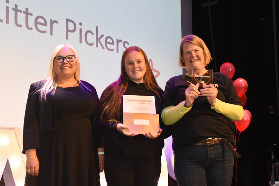 Winner, Hebburn Litter Pickers, collecting their award
